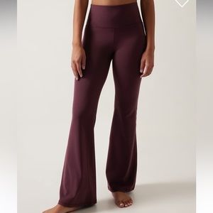 Athleta Elation Flare Pant in spiced Cabernet, size Medium
